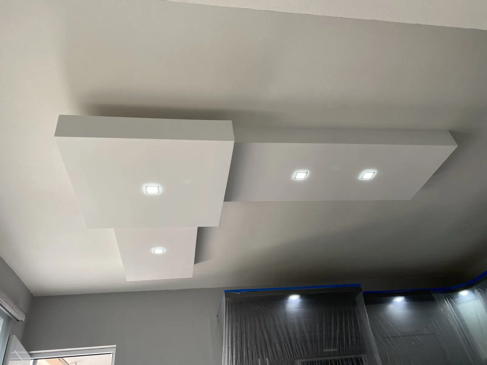 Layered fascia ceiling with recessed lights